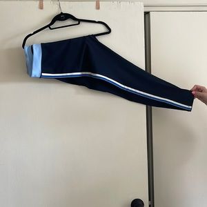 Splits59 XL 7/8 navy blue leggings with blue and white striped sides